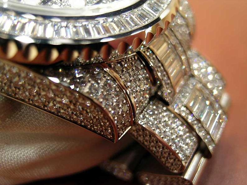 The luxury fake Rolex GMT-Master II 116769TBR watches are made from 18k white gold and diamonds.