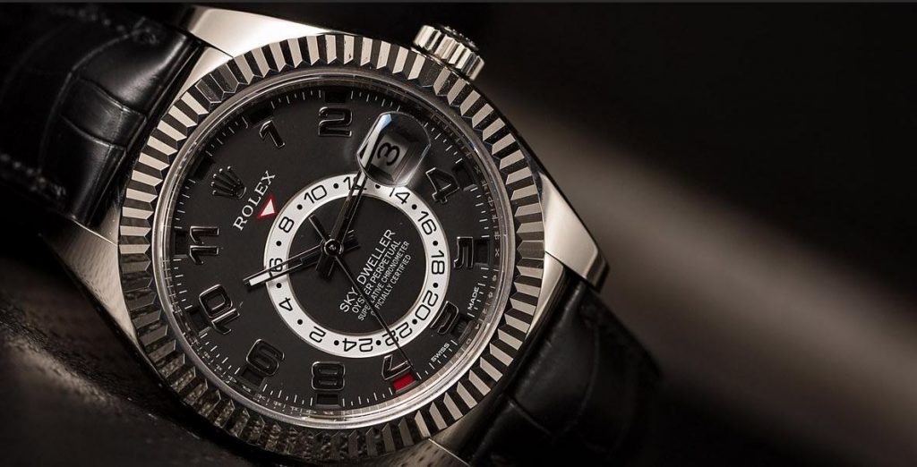 The 42 mm copy watches have black dials.